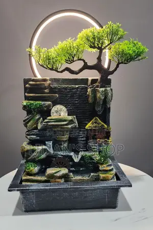 Tabletop Water Fountain With an Artificial Bonsai Tree Design
