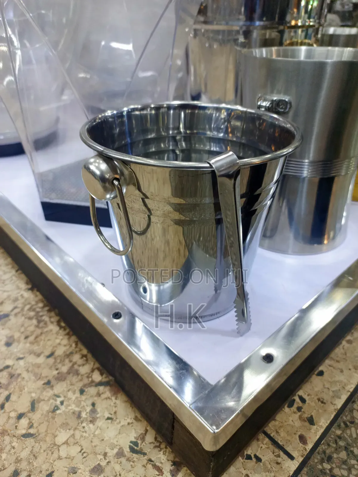 Stainless Steel Ice Bucket With Accompanying Tongs.