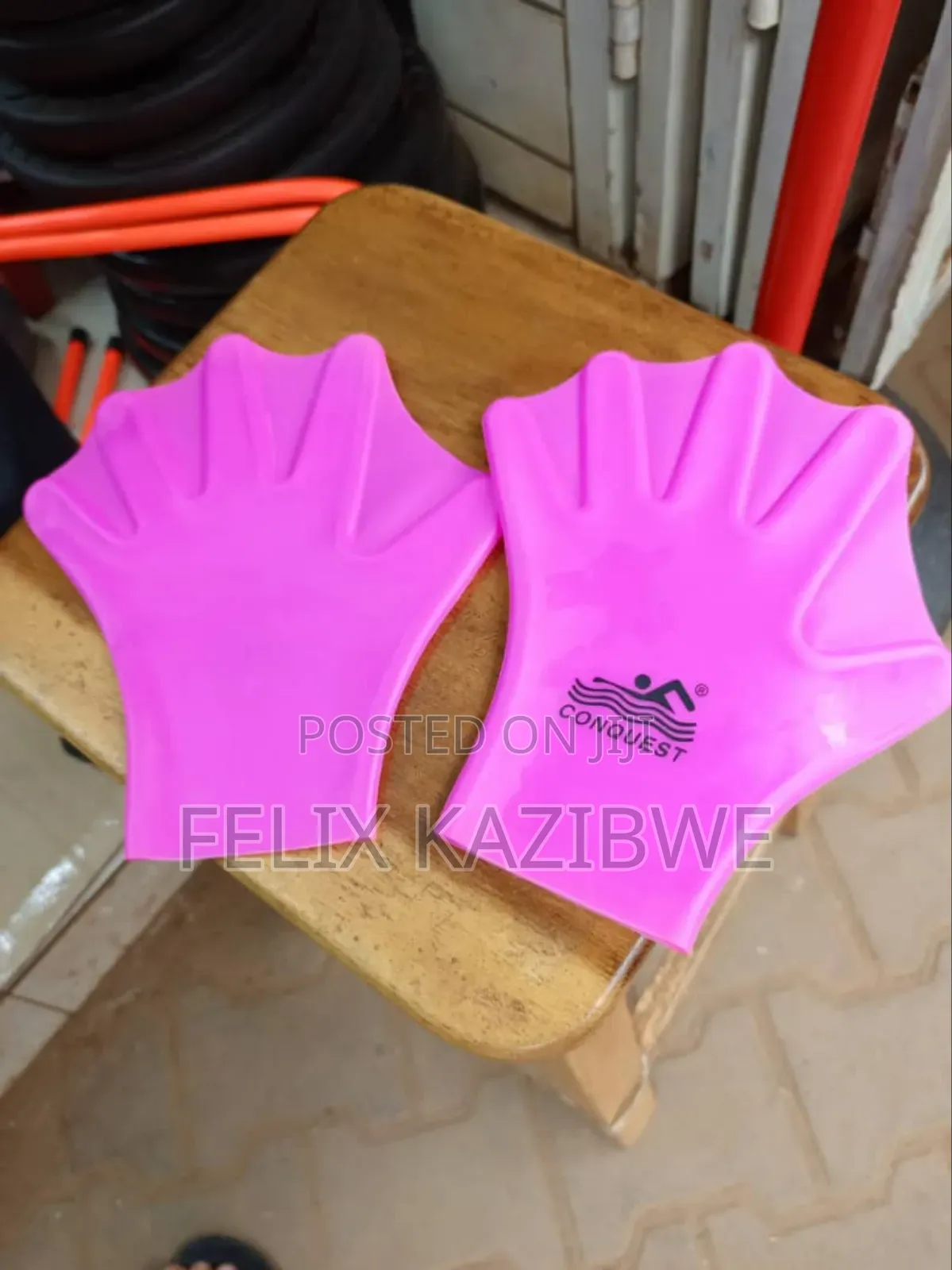A Pair of Conquest Webbed Swimming Gloves.
