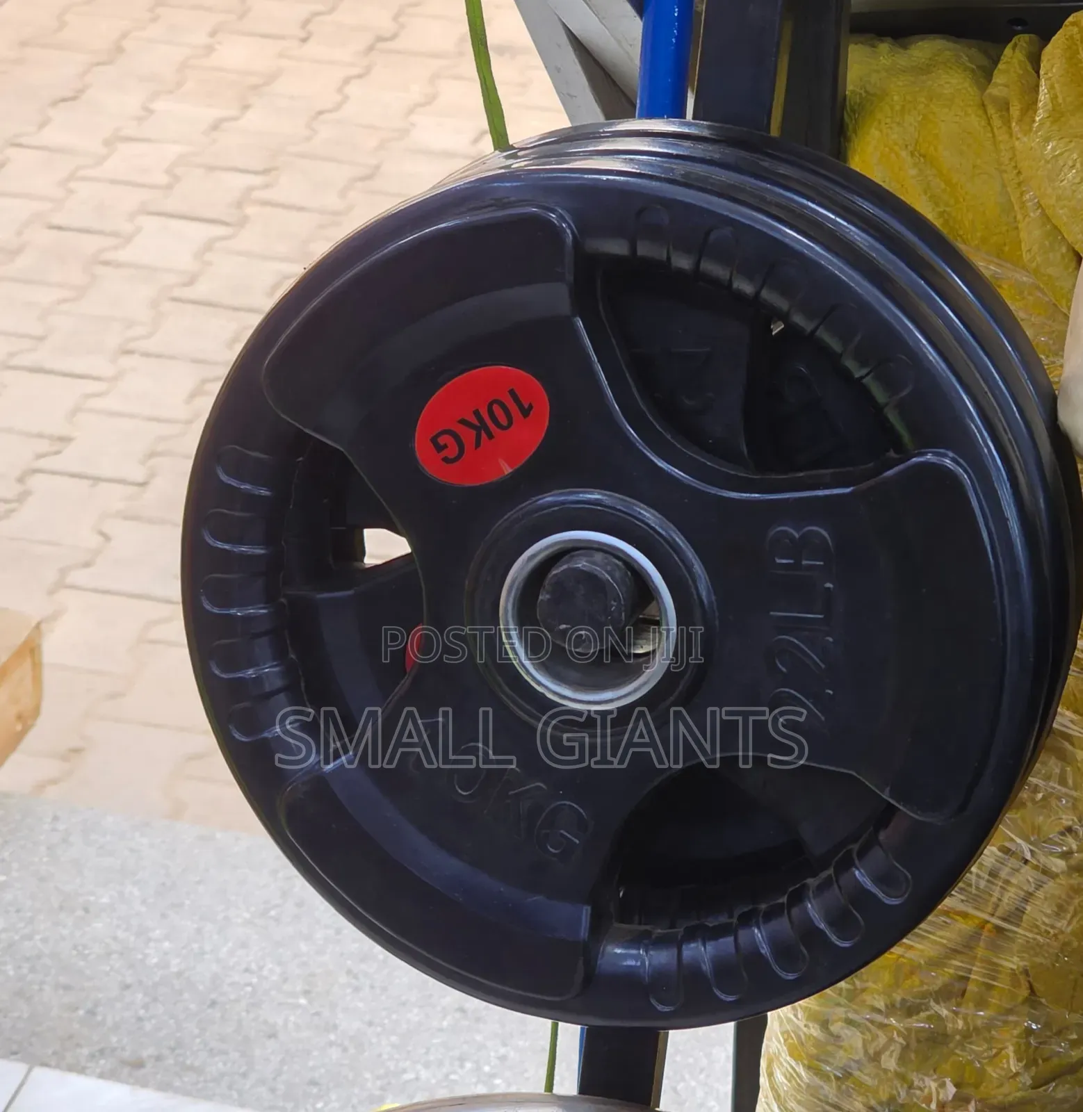 10kg (22lb) Olympic Rubber-Coated Weight Plate With a Tri-Grip Design.