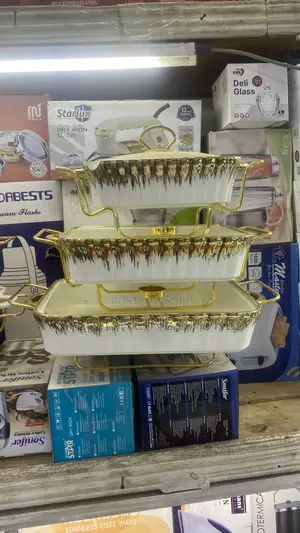 A Set of 3 Ceramic Serving Dishes With Stand