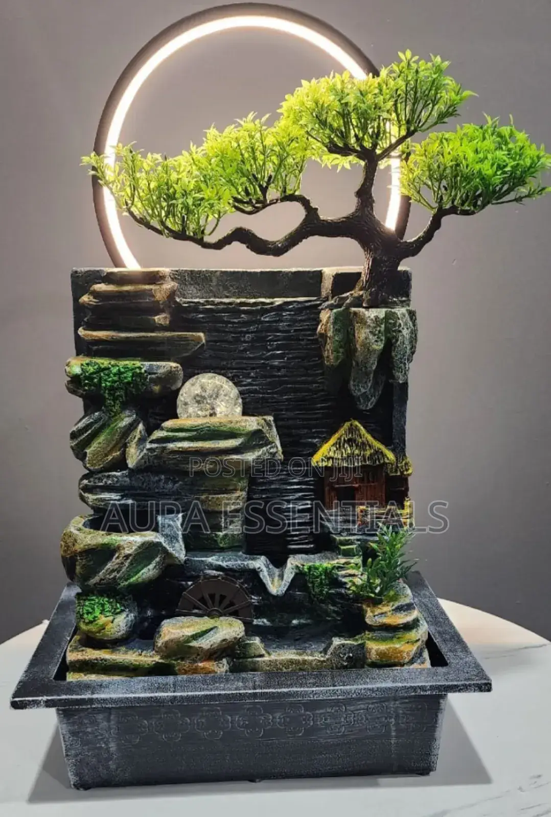 Tabletop Water Fountain With an Artificial Bonsai Tree Design