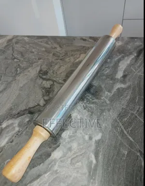 Stainless Steel Rolling Pin With Wooden Handles.