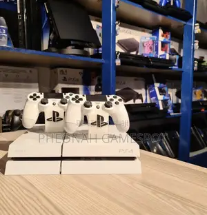 Ps4 Smooth Action Gaming Unit With 2 Controllers and 12 Games.