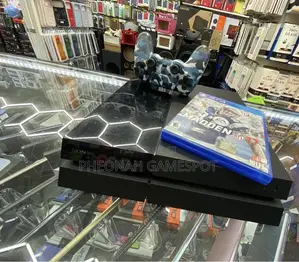 Ps4 Home Entertainment System, 2 Pads Included With 18 Games.