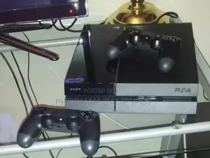 Ps4 Smooth and Powerful Console With 2 Controllers and 12 Games.