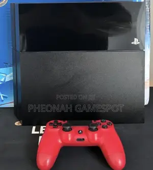 Ps4 Clean Tested Console With 2 Controllers and 11 Games Inside.
