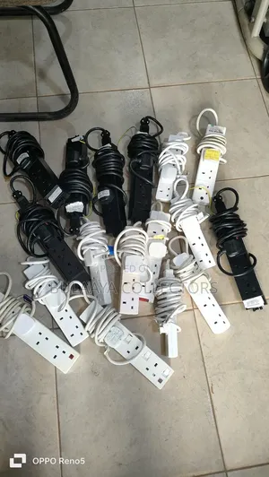 Various 4-Way Power Extension Cords With Uk-Type Plugs and Sockets.