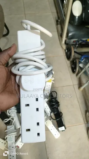 Various 4-Way Power Extension Cords With Uk-Type Plugs and Sockets.