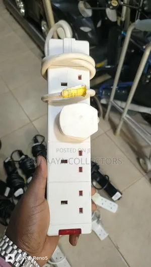 Various 4-Way Power Extension Cords With Uk-Type Plugs and Sockets.