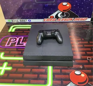 Ps4 Clean Tested Console With 2 Controllers and 14 Quality Games.