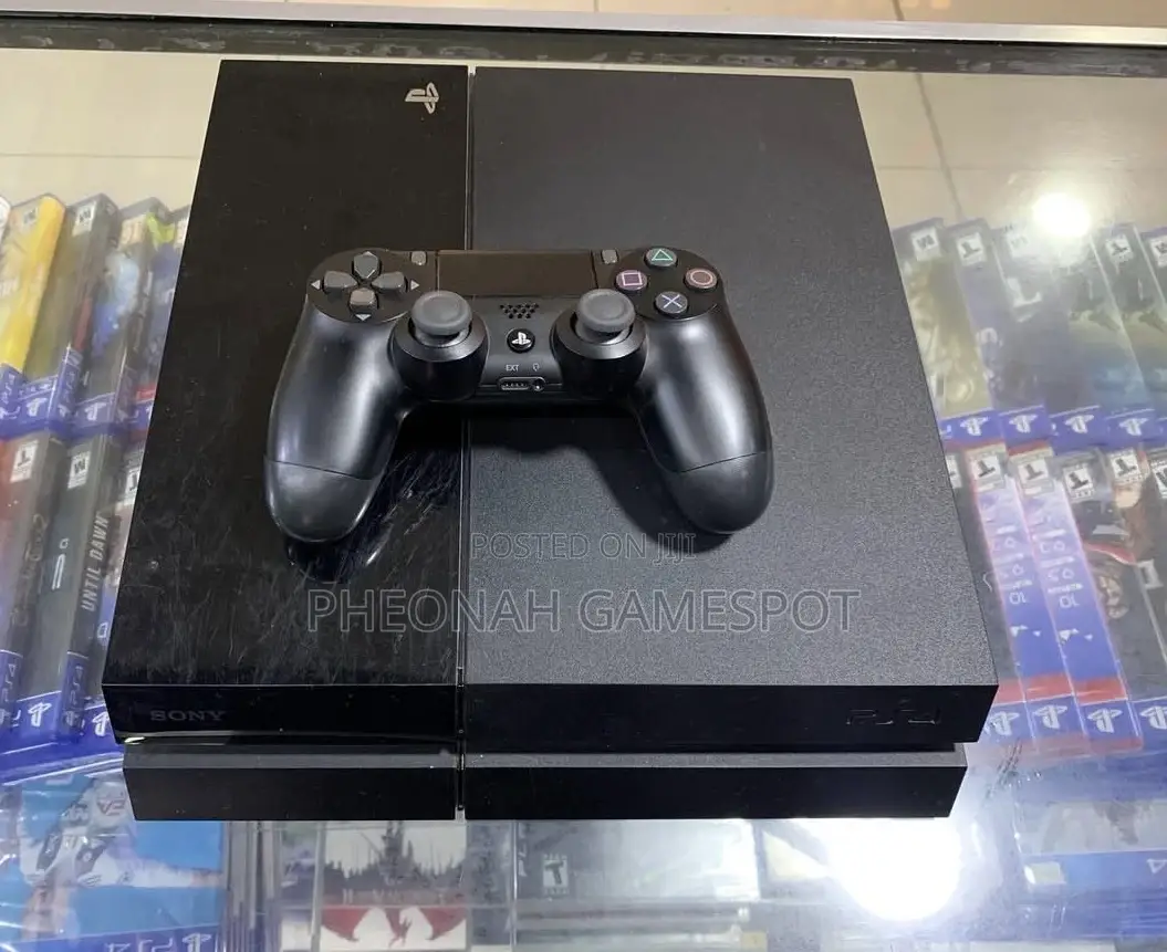 Ps4 Clean Reliable System With 2 Controllers and 14 Games Onboard.