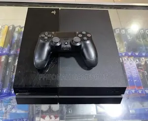 Ps4 Clean Reliable System With 2 Controllers and 14 Games Onboard.