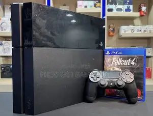 Ps4 Clean Reliable Console With 2 Controllers and 14 Hot Games.
