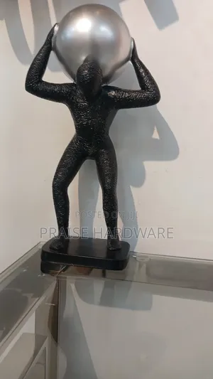 Man Carrying Globe Black