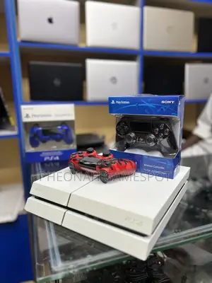 Ps4 Premium Entertainment Bundle, 2 Pads Plus 15 Games Loaded.