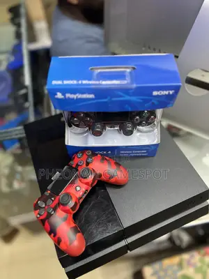 Ps4 Relaxed Home Gaming Setup, 2 Pads Included With 18 Games.