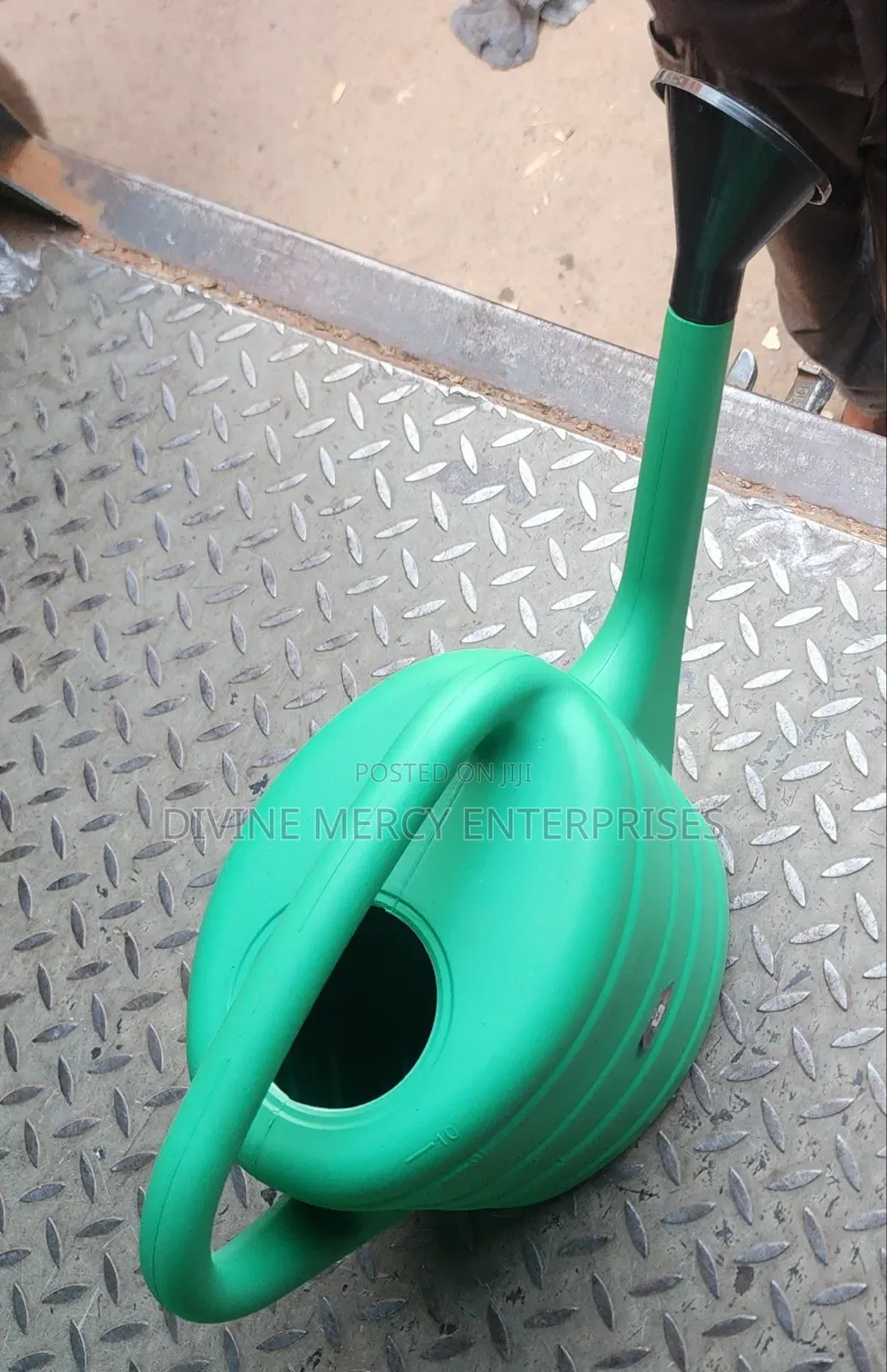 Green Plastic Watering Can