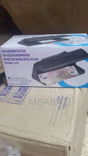 Uv Counterfeit Money Detector, Model 318.