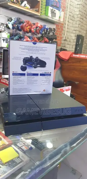 Sony Ps4 System - Bundle Includes 10 Games 2 Controllers