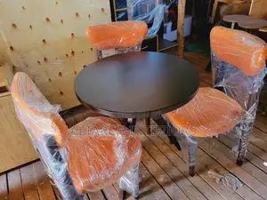 3 Seater Dining Set Well Finished in Coffee Brown and Orange Seats