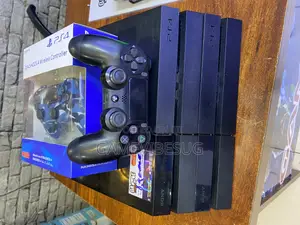 Holiday Ps4 Standard Deal: 2 Controllers, 8 Games, Cords, Wired
