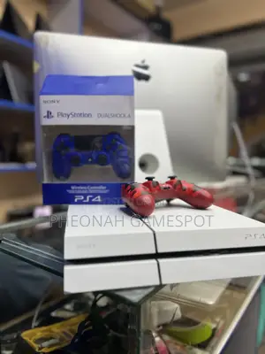 Ps4 Effortless Gaming System With 2 Controllers and 14 Games.