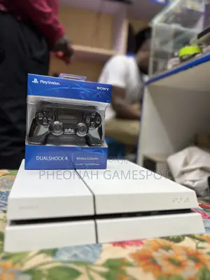 Ps4 Relaxed Console Deal, 2 Pads Included and 15 Games Loaded.