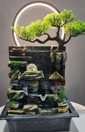 Tabletop Water Fountain With an Artificial Bonsai Tree Design