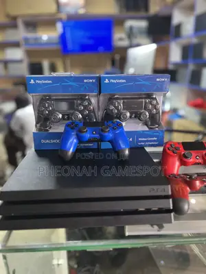 Ps4 Pro Relaxed Console Deal, 2 Pads Included and 25 Games Loaded.