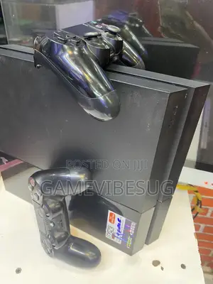 Ps4 Standard Uk Used - Includes 2 New Pads and 7 Top Games
