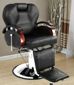 Black Barber Chair With Wooden Armrests