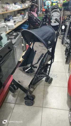 Maclaren Quest Sport Stroller in the Black and Champagne Colorway.