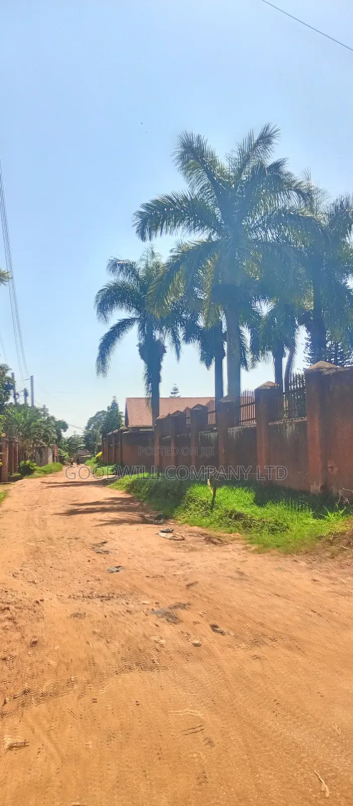 1 Acre of Land in Namugongo (W/T Old Fashioned House 6units Rentals