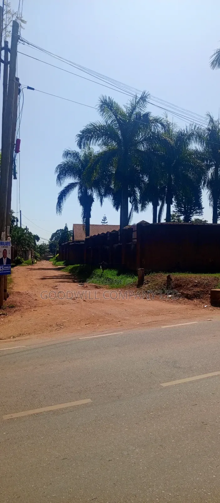1 Acre of Land in Namugongo (W/T Old Fashioned House 6units Rentals