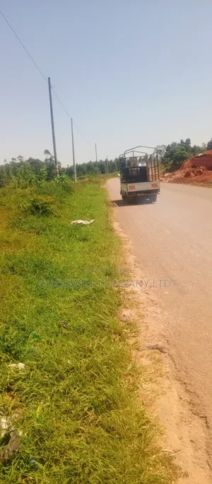 4 Acres of Commercial Land on Gayaza-Kayunga Tarmac Road in Nakasaja