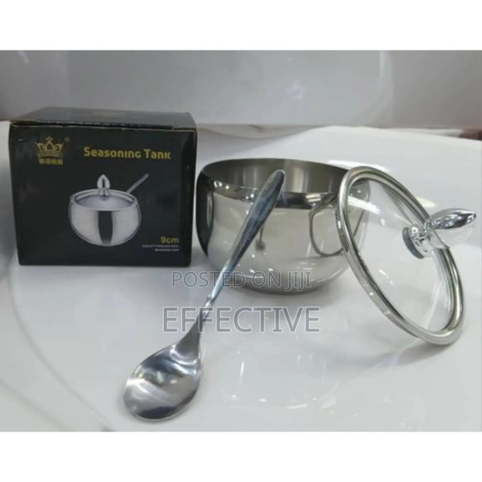 Stainless Steel Sugar Bowl With a Glass Lid and Spoon.