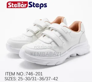 Apair of Stellar Steps White School Sneakers