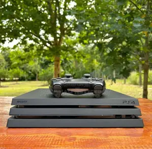 Playstation 4 Pro: 25 Games, 2 Pads. Chipped! Win and Dance Lingala
