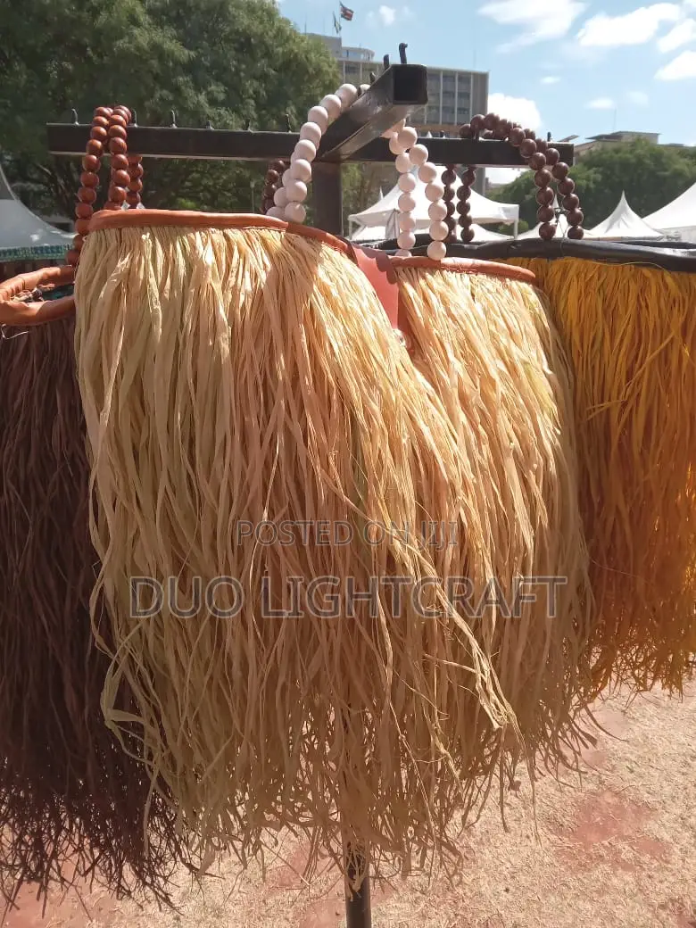 Handwoven Palm Leaves Kikapu Basket With Leather and Raffia Details