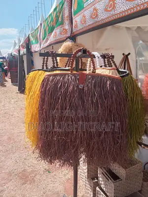 Handwoven Palm Leaves Kikapu Basket With Leather and Raffia Details