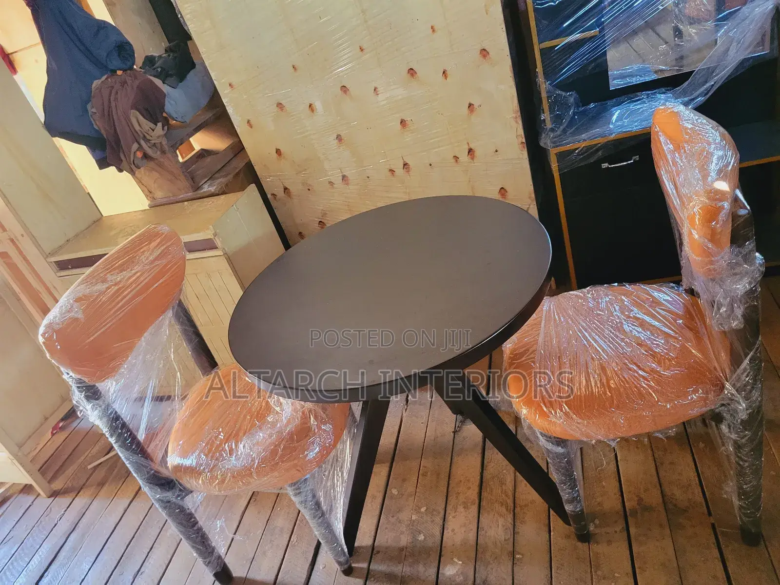 2 Seater Dining Set Well Finished in Coffee Brown and Orange Seats