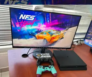 Used Ps4 Slim: Used by a Ghost, Looks New. Comes With 12 Games, 2 Pads