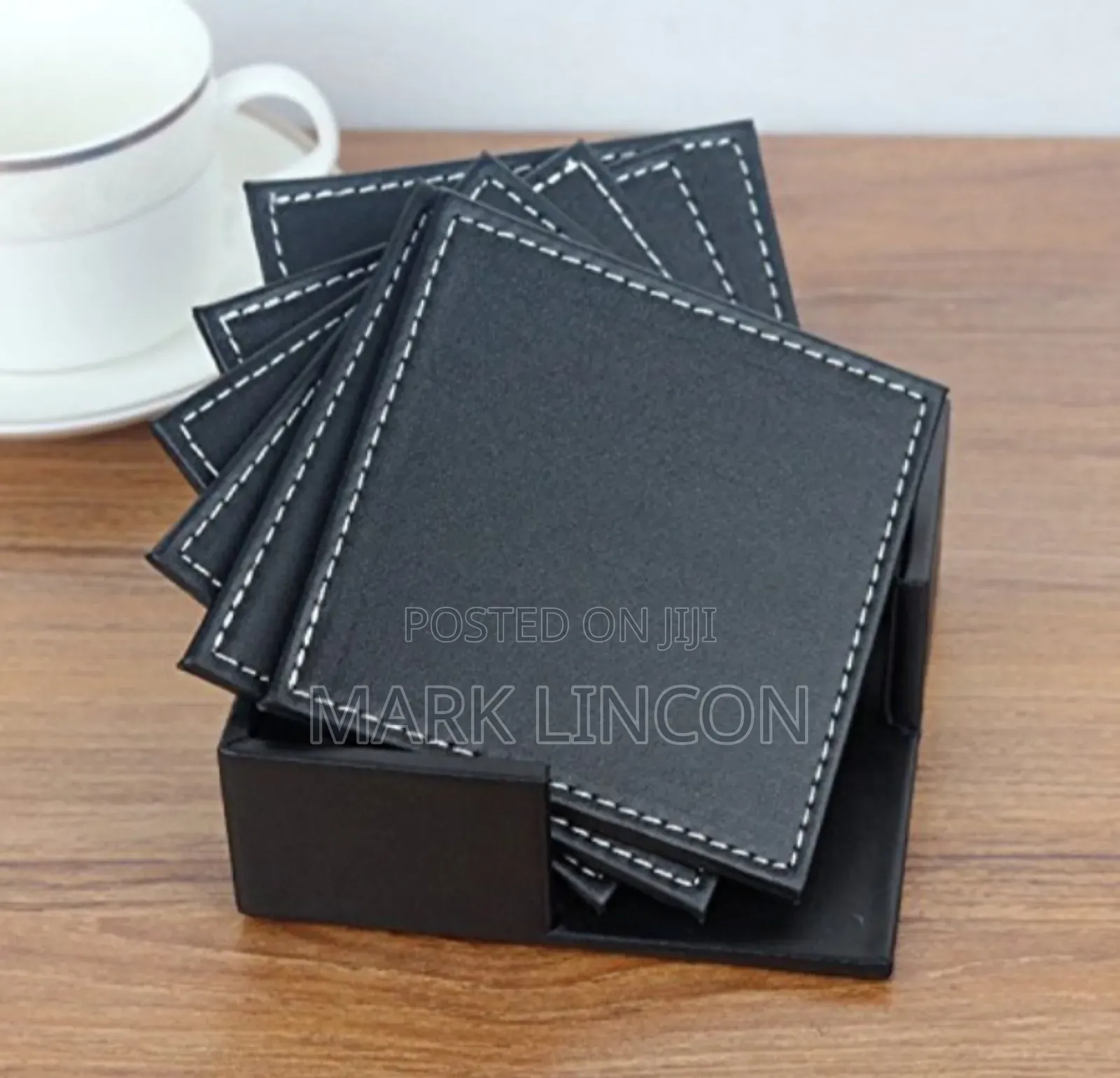 A Set of Black Leather Coaster or Tea Covers