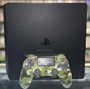 Chipped Playstation 4 Slim Gaming Console. Comes With 12 Games. Clean
