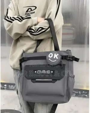 Multi-Pocket Tote Bag Made of Water-Resistant Nylon Material.