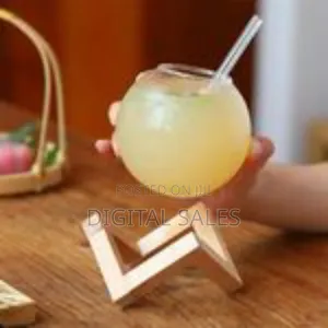 Modern Spherical Glass Beverage Vessel With Geometric Wooden Stand