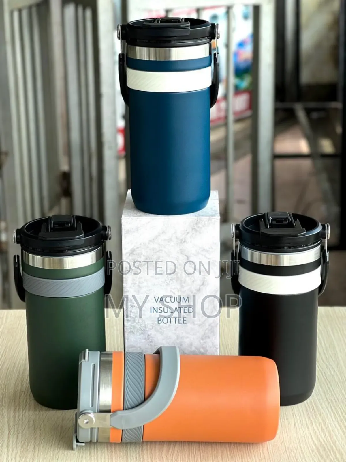 A Vacuum Cup With a Handle- Keeps Hot and Cold