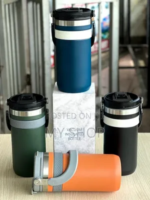 A Vacuum Cup With a Handle- Keeps Hot and Cold