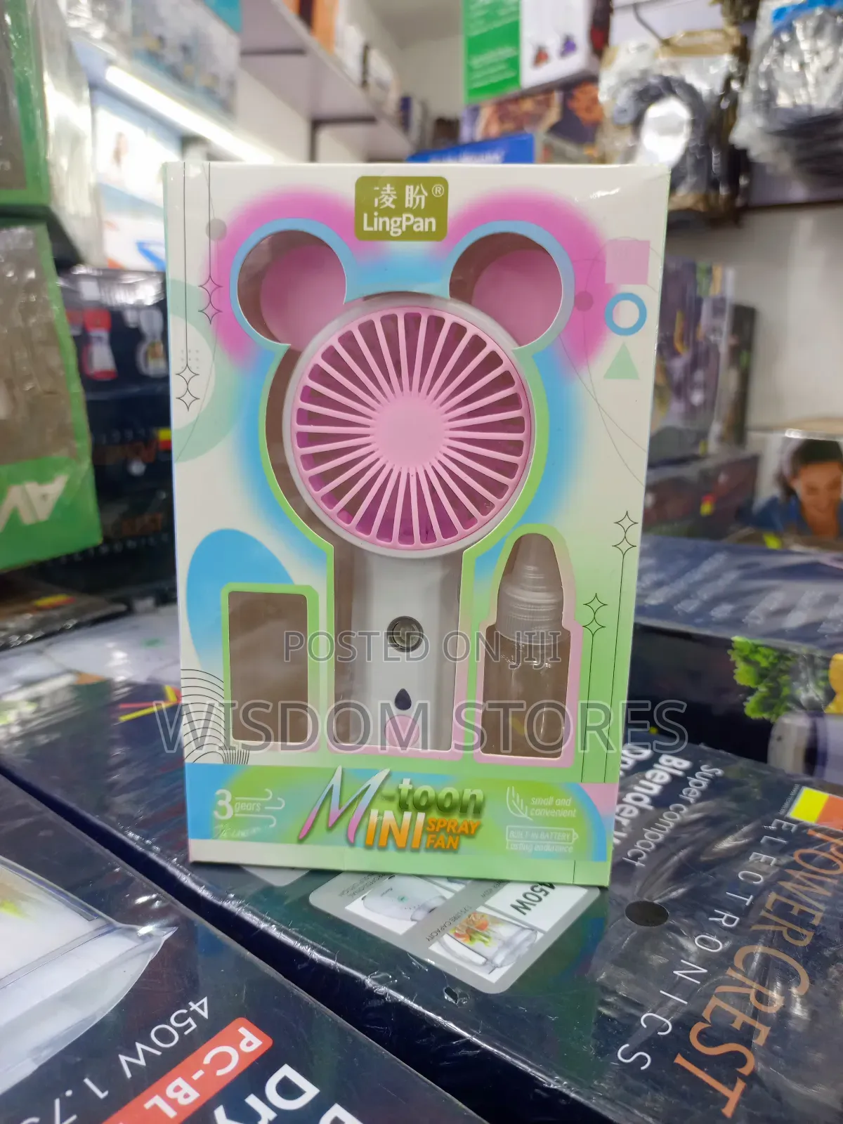 Portable Mini Fan With a Mist Spray Function.